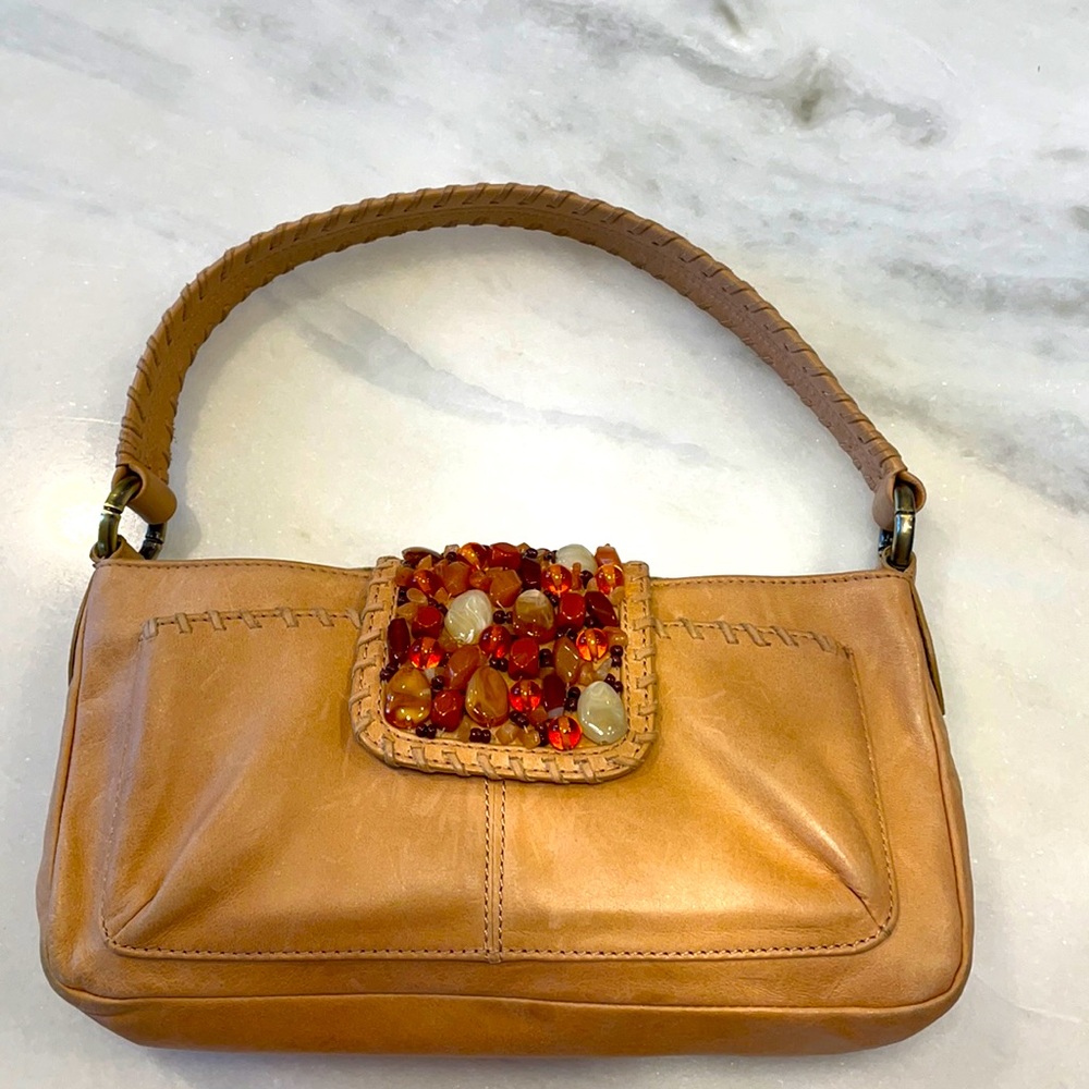 Tommy Bahama leather handbag with multi stones.